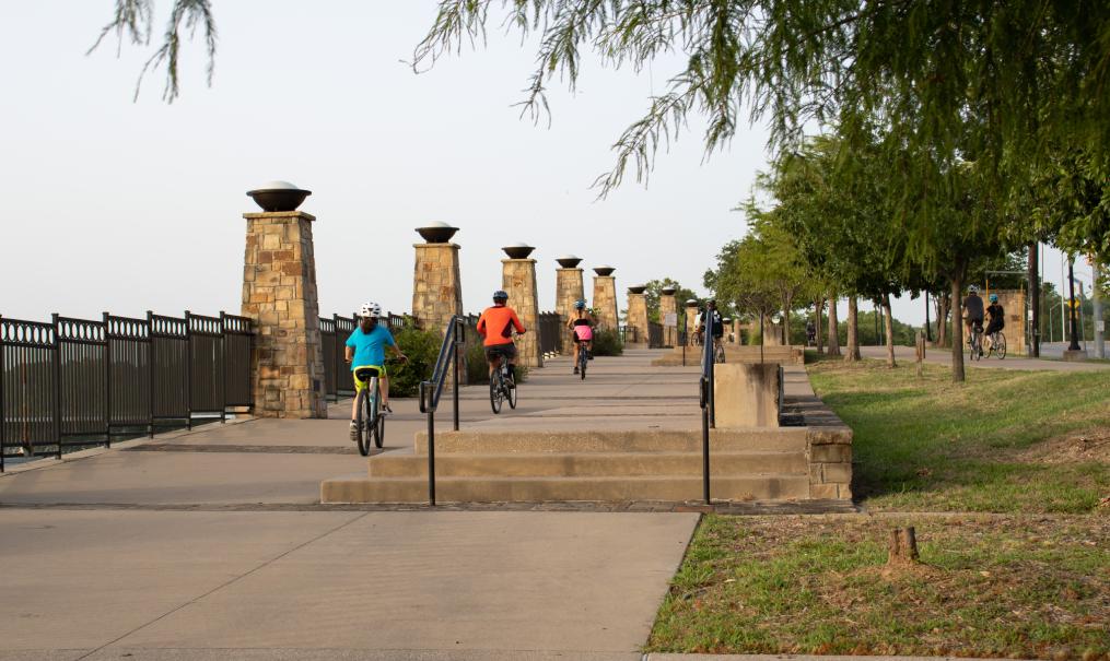 Bike riders in White Rock Lake during the summer