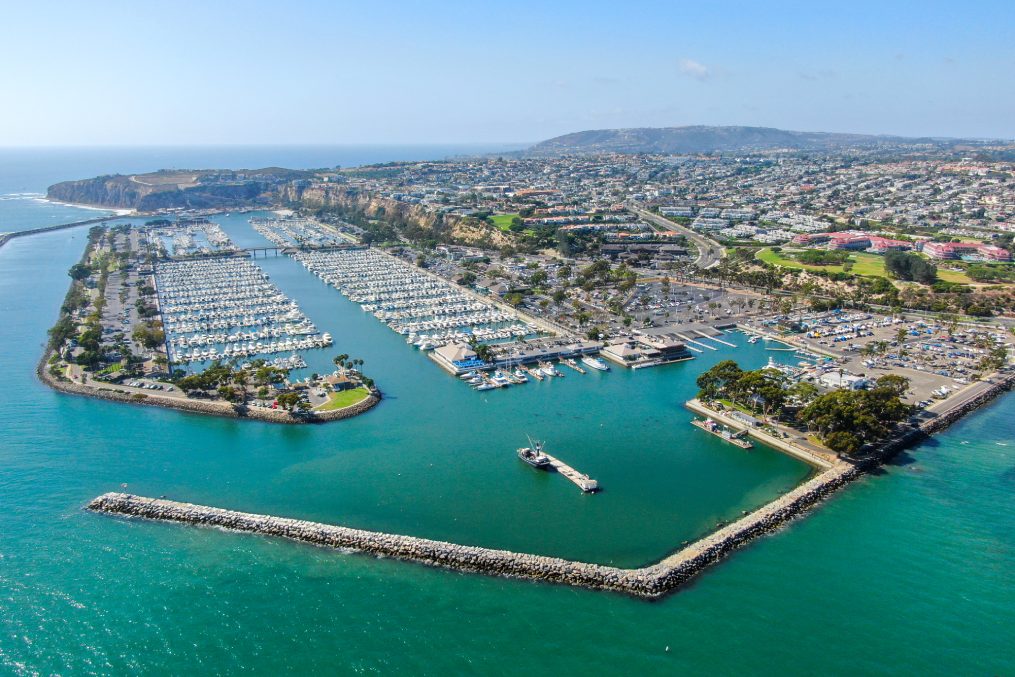 Aerial view of Dana Point Harbor and her marina with yacht and sailboat. southern Orange County, California. USA