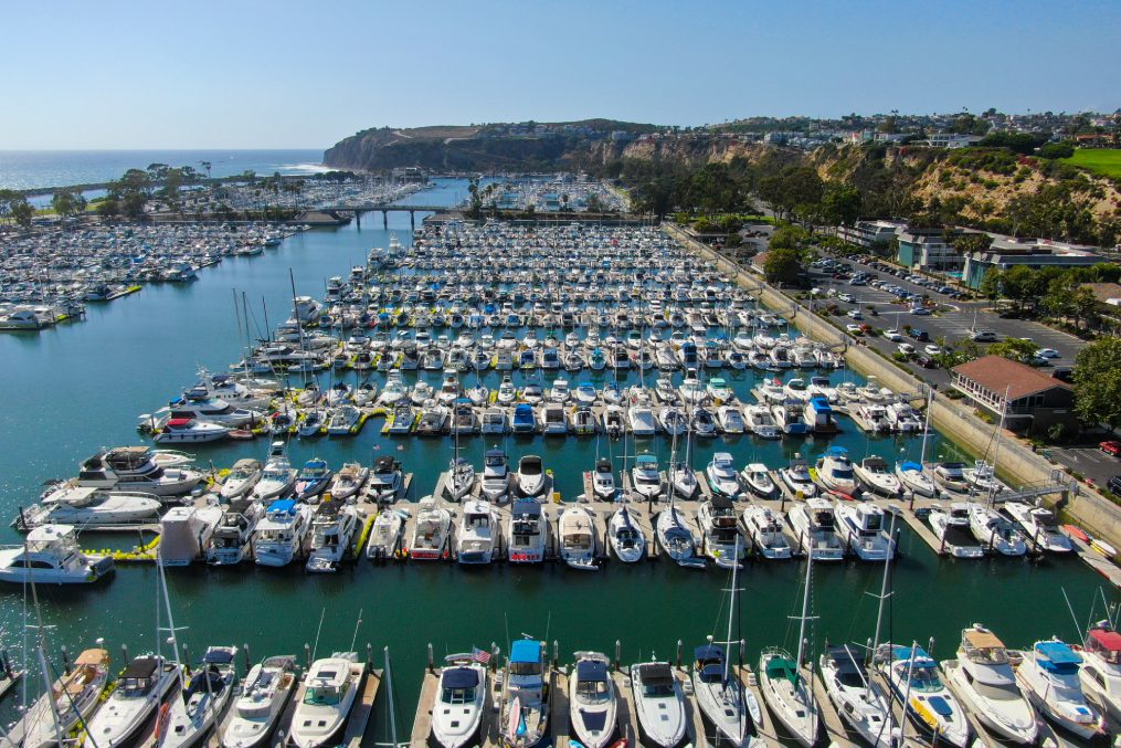 Aerial view of Dana Point Harbor and her marina with yacht and sailboat. southern Orange County, California. USA