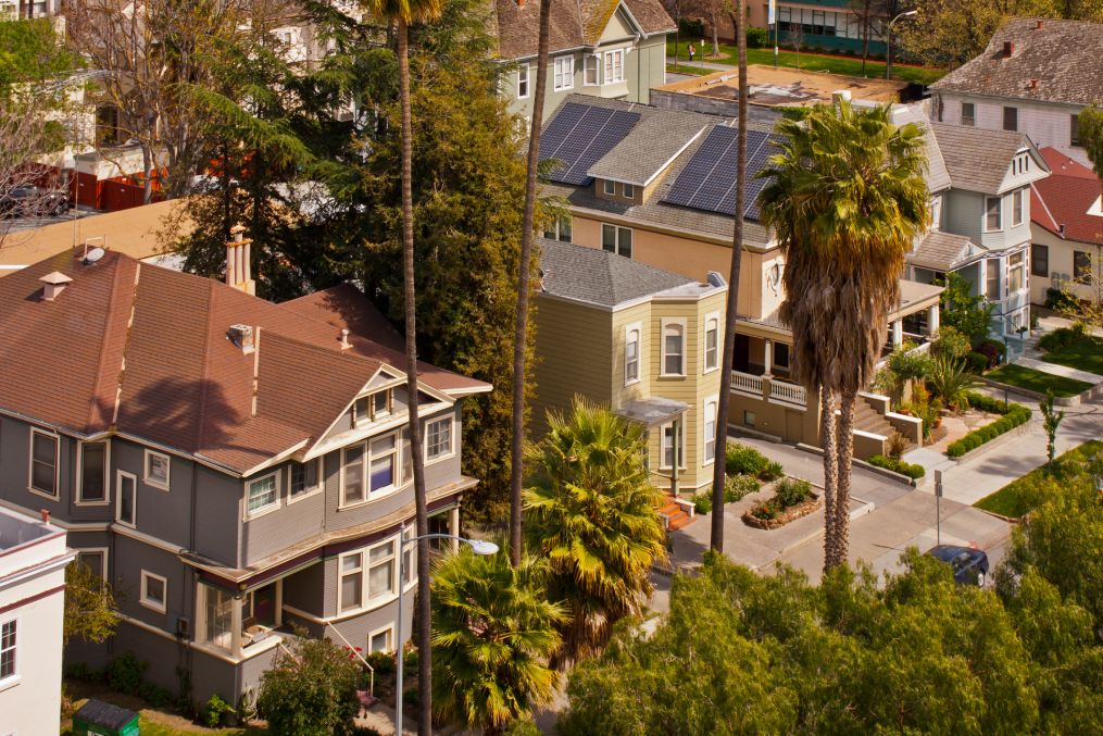 A high angle view of a row of Victorian style houses in San Jose, California.