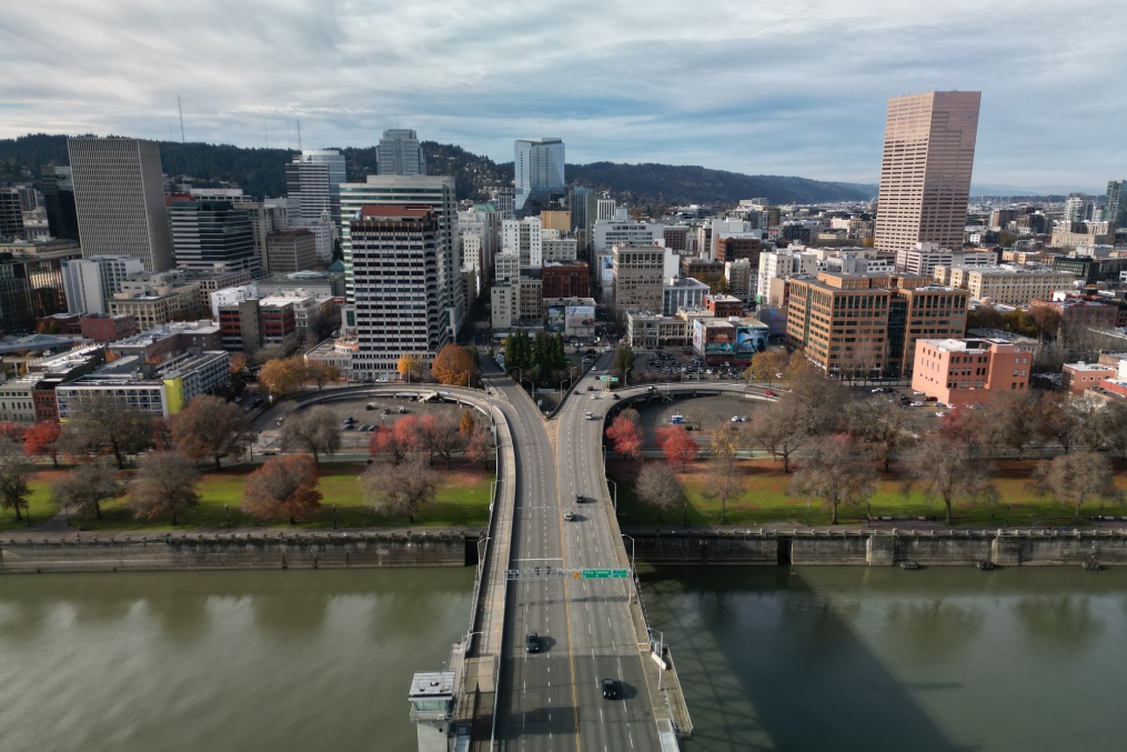 Aerial drone shot of the Morrison Bridge in Portland, Oregon in late November on a cloudy, overcast morning