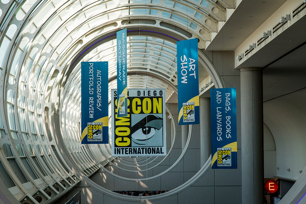 A large building featuring a prominent "Comic Con" sign, highlighting a key summer event in San Diego 2025.