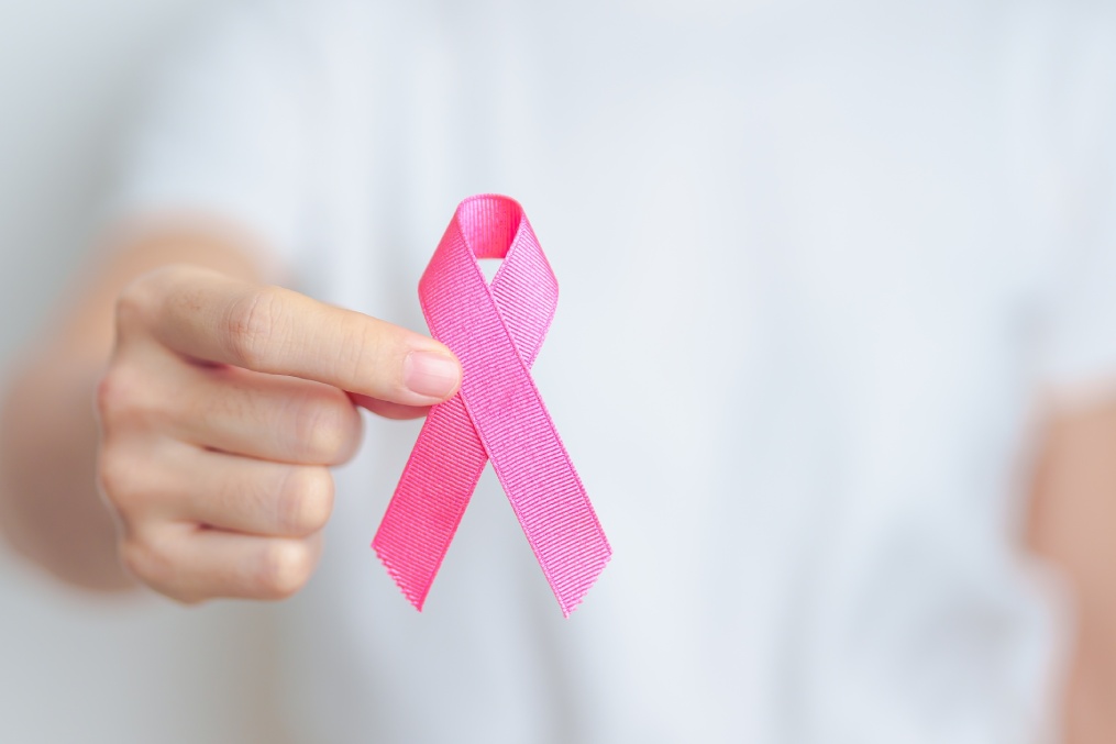 Pink October Breast Cancer Awareness month, woman with pink Ribbon in hospital for support people life and illness. National cancer survivors month, Mother and World cancer day concept