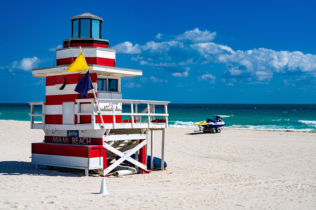 A lifeguard tower on a beach, providing safety and surveillance for beachgoers in a vibrant coastal city like Miami.
