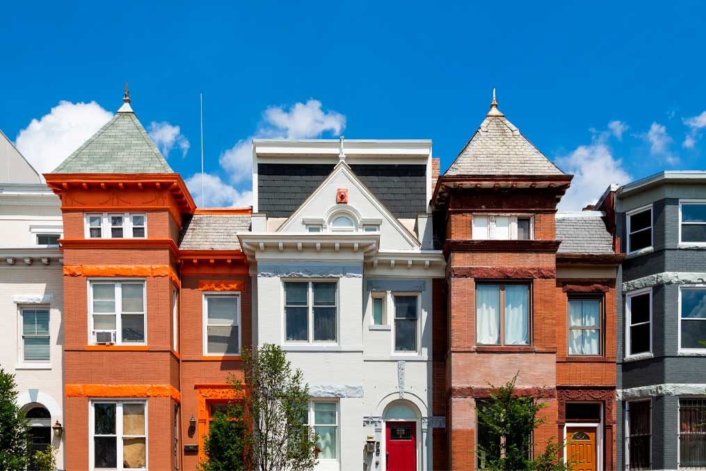 Row houses in the Washington DC neighborhood of Bloomingdale on a summer day.