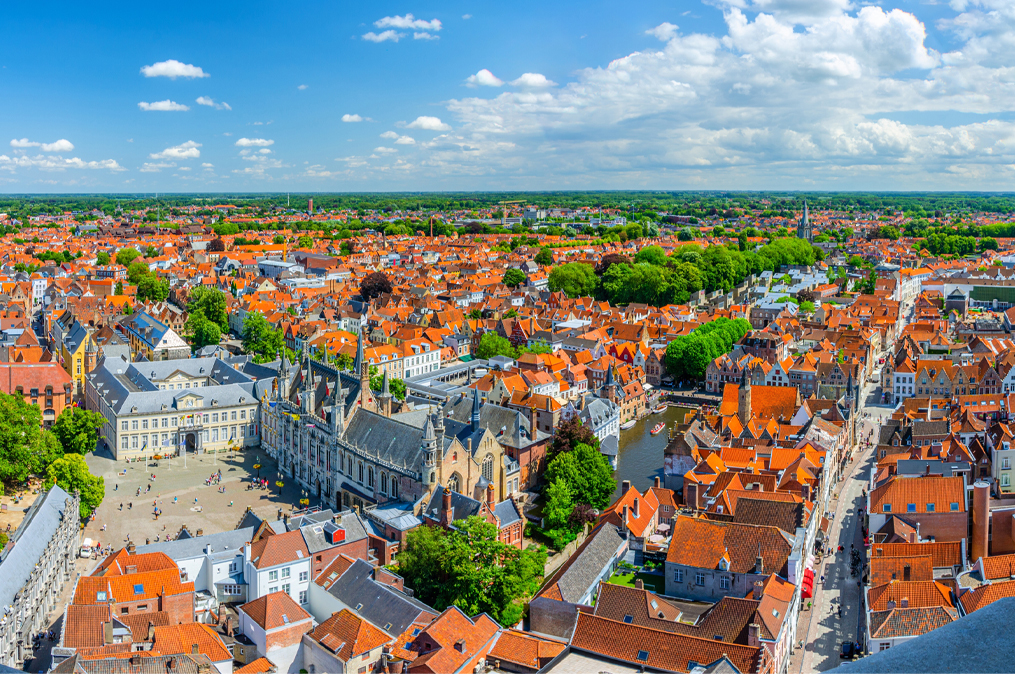 Aerial panoramic view of Bruges city centre, old buildings, Bruges City Hall, Basilica Holy Blood, Bruges Vrije palace, Rosary Quay Rozenhoedkaai, Panorama of Brugge old town, Flemish Region, Belgium